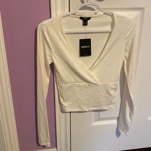 Knitted cream cropped top